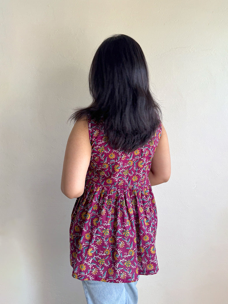 Noor Sleeveless Peplum Top