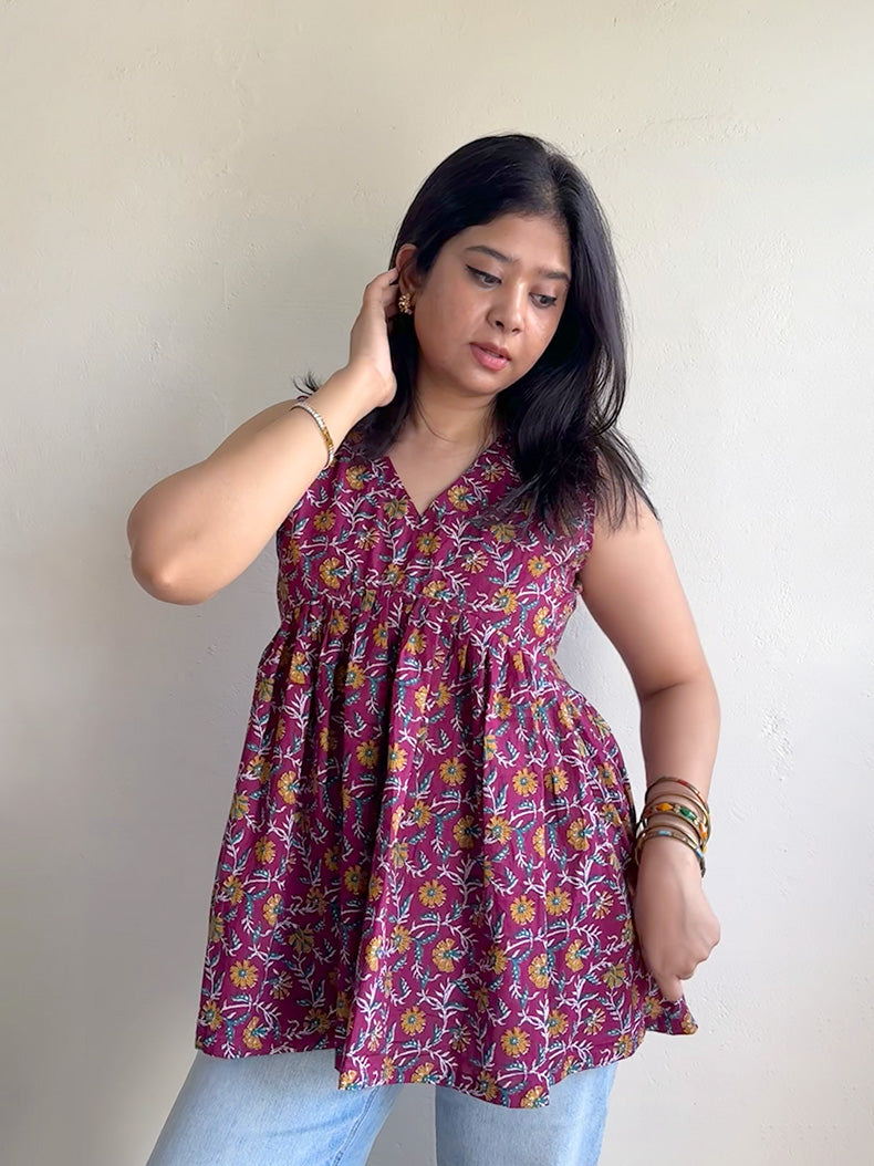 Noor Sleeveless Peplum Top